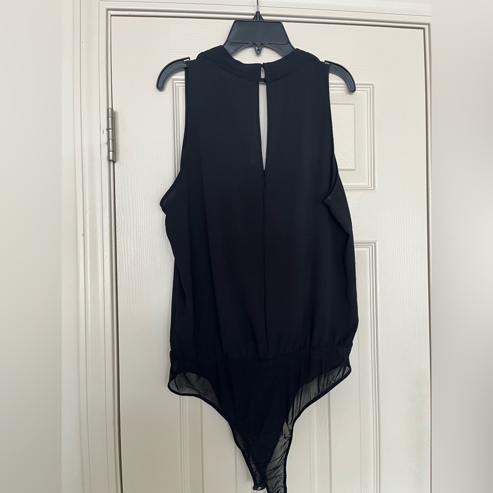 Black bodysuit.